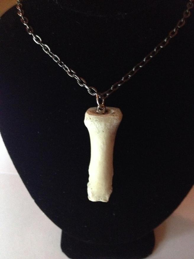 large_human_finger_bone_necklace__metacarpal__by_humanbonejewelry_d71uzi2-fullview